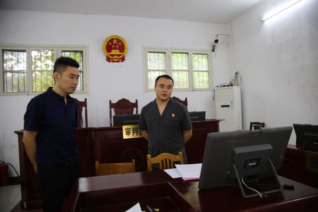 洞口法院党组书记、代院长唐凌峰调研法庭工作(图1)